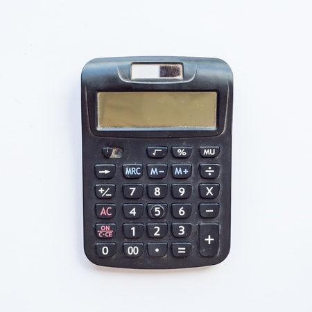 Old Calculator on white backgroundの写真素材
