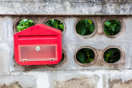 A red mailbox on home page の写真素材