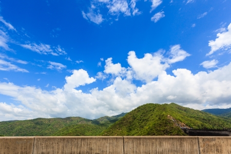 Blue sky and green mountainの写真素材