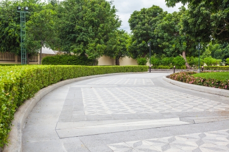 Stone Pathway in a Lush Green Parkの写真素材