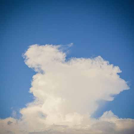 White clouds in blue sky vintage