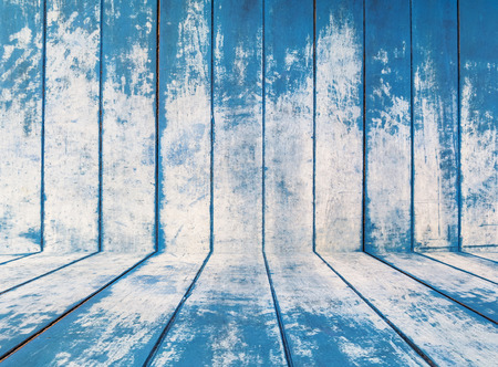 blue texture of rough wooden fence boards backgroundの写真素材