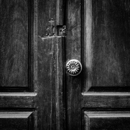 close up old handle door black vintageの写真素材