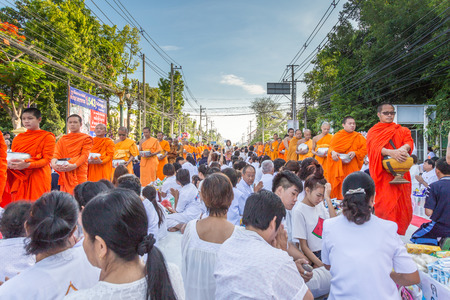 CHIANG MAI, THAILAND - May 31 : Many people give food and drink for alms to 1,536 Buddhist monks in visakha bucha day on May 31, 2015 in Chiang Mai, Thailand.のeditorial素材
