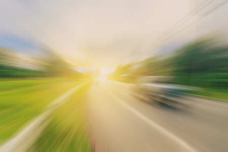 abstract empty asphalt blurry road and sunlight with spaceの写真素材
