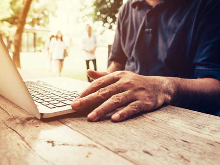 young business man using computer laptop in coffee shop.の写真素材