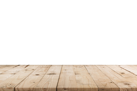 Empty wood table on isolated white background with display montage for product.の写真素材