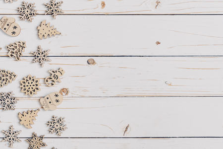 Wooden white and christmas background with snowflakes and christmas decoration.の写真素材