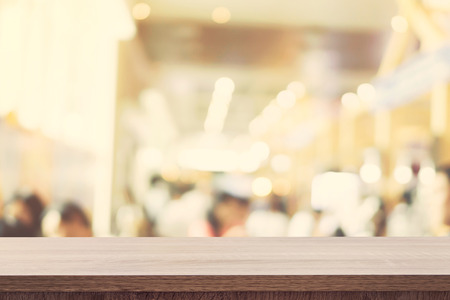 Empty wooden table top and Blur image background with space display montage for product.の写真素材