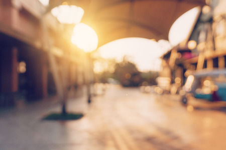 Vintage tone blurred defocused day of crowd peopel in walking street festival and shopping mall.の写真素材