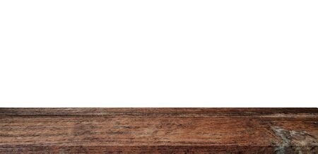 Empty wood table on isolate white background and display montage with copy space for product.の写真素材