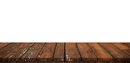 Empty wood table on isolate white background and display montage with copy space for product.の写真素材