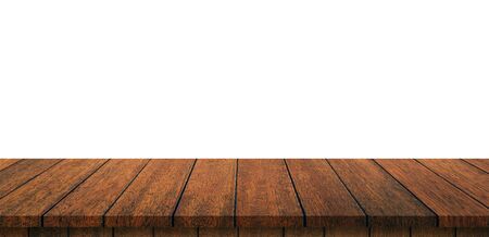 Empty wood table on isolate white background and display montage with copy space for product.の写真素材