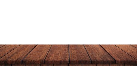 Empty wood table on isolate white background and display montage with copy space for product.の写真素材