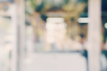 Blur coffee shop or cafe restaurant with bokeh lightの写真素材