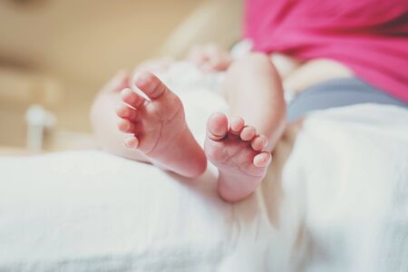 close up of newborn baby feet.の写真素材