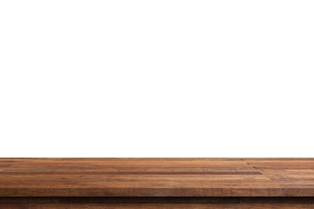 Empty wood table on isolate white background and display montage with copy space for product.の写真素材