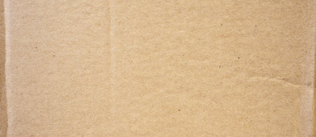 Brown cardboard sheet abstract background. texture of recycle paper box.