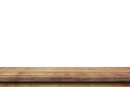 Empty wood table on isolate white background and display montage with copy space for product.の写真素材