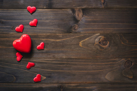 Red heart on wooden background, valentain background with copy space.の写真素材
