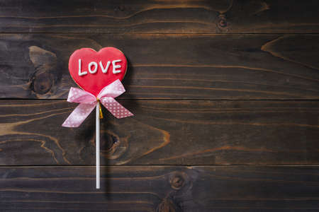 Valentines day heart shaped cookies on wooden table background with copy space.の写真素材