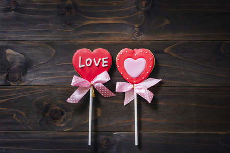 Valentines day heart shaped cookies on wooden table background with copy space.の写真素材