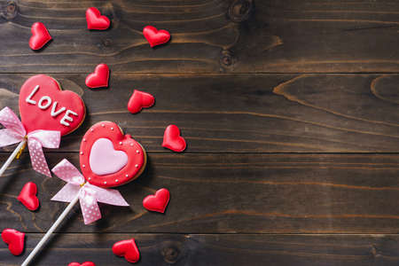 Valentines day heart shaped cookies on wooden table background with copy space.の写真素材