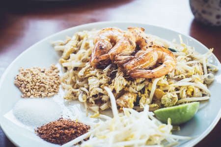 Home Made Pad thai with Shrimp and Vegetables on  tableの写真素材