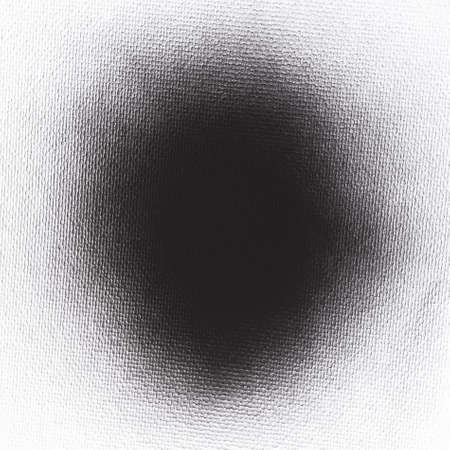 black ink shape on watercolor paper texture backgroundの写真素材