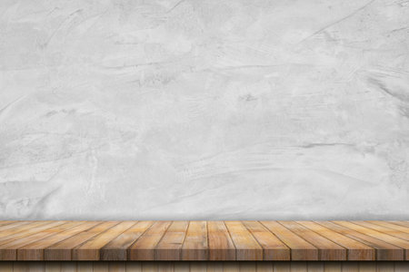 old cement wall interior vintage and wooden table background.の写真素材
