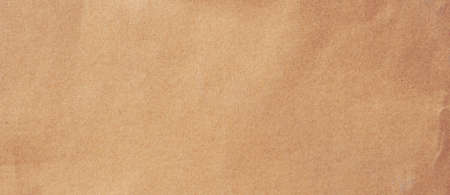 Close up crumpled brown paper texture and background with copy spaceの写真素材