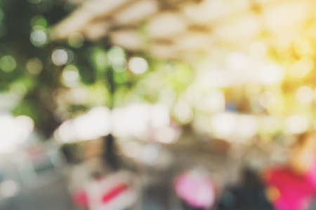 Abstract blurred light in coffee shop and cafe with bokeh backgroundの写真素材