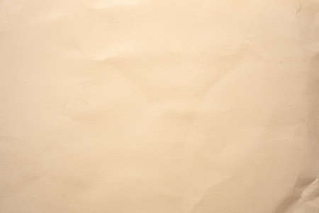 Close up crumpled brown paper texture and background with copy spaceの写真素材