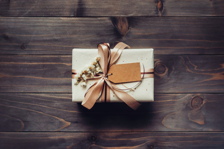 Craft gift box on table wooden background with copy space