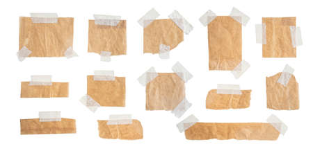 Brown paper labels attached set with sticky tape on isolate white backgroundの写真素材