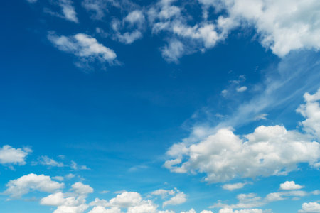 Blue sky and white clouds. fluffy cloud in the blue sky backgroundの写真素材