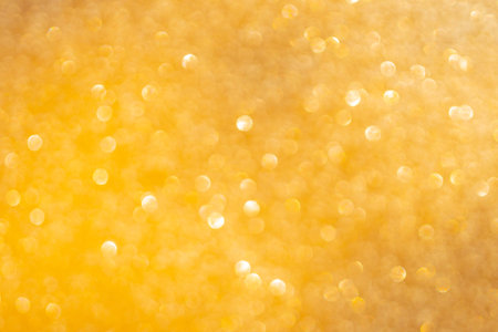 Yellow bokeh and defocused background with copy spaceの写真素材