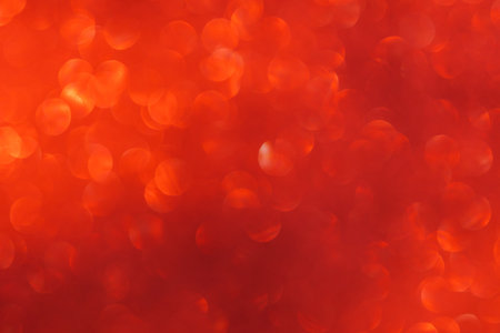 Red bokeh and defocused background with copy spaceの写真素材