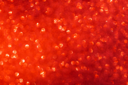 Red bokeh and defocused background with copy spaceの写真素材