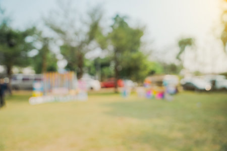 Abstract blur garden and green tree, field meadow with sunlightの写真素材