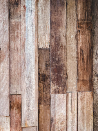 Detail of a brown wooden wall texture and background with copy spaceの写真素材
