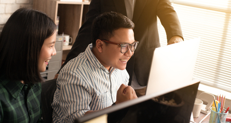 Asian people working together in the office.の写真素材