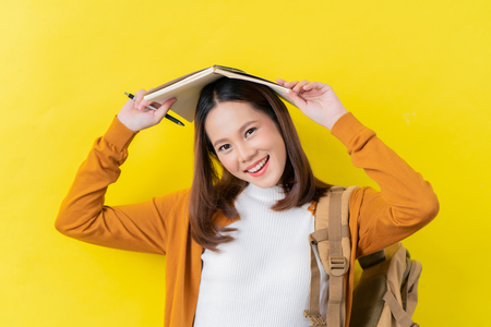 Asian student   using notebooks.の写真素材