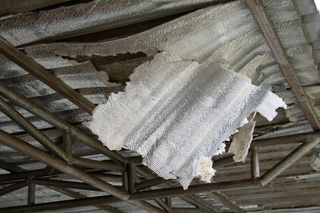 expired polyethylene foam insulation ( pe foam) under metal sheet roofの写真素材