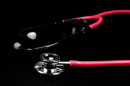 Stethoscopes are among the most important tools a nurse or doctor on black background