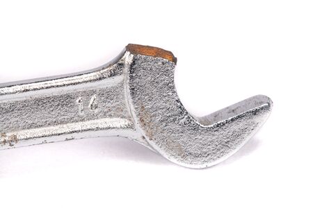 Close-up broken wrench isolated on white backgroundの写真素材
