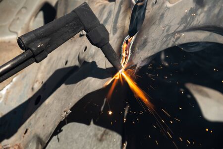 Oxy-Fuel Cutting Torch to cutting car for metal recyclingの写真素材