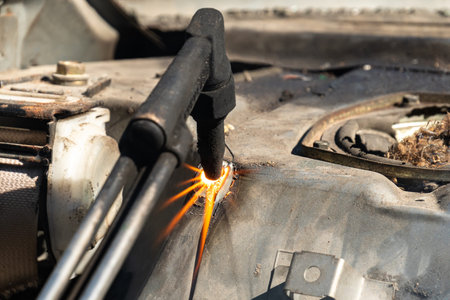 Oxy-Fuel Cutting Torch to cutting car for metal recycling