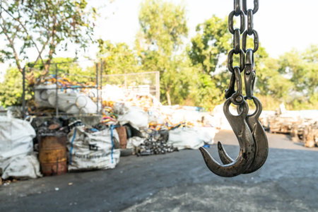 used forklift hook in the recycling industry plant with selective focus.
