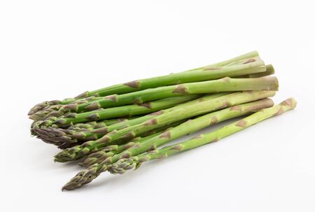 Fresh green asparagus spears on white backgroundの写真素材